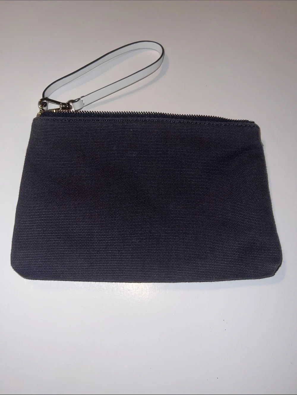 kate spade plum canvas wristlet with gold spade